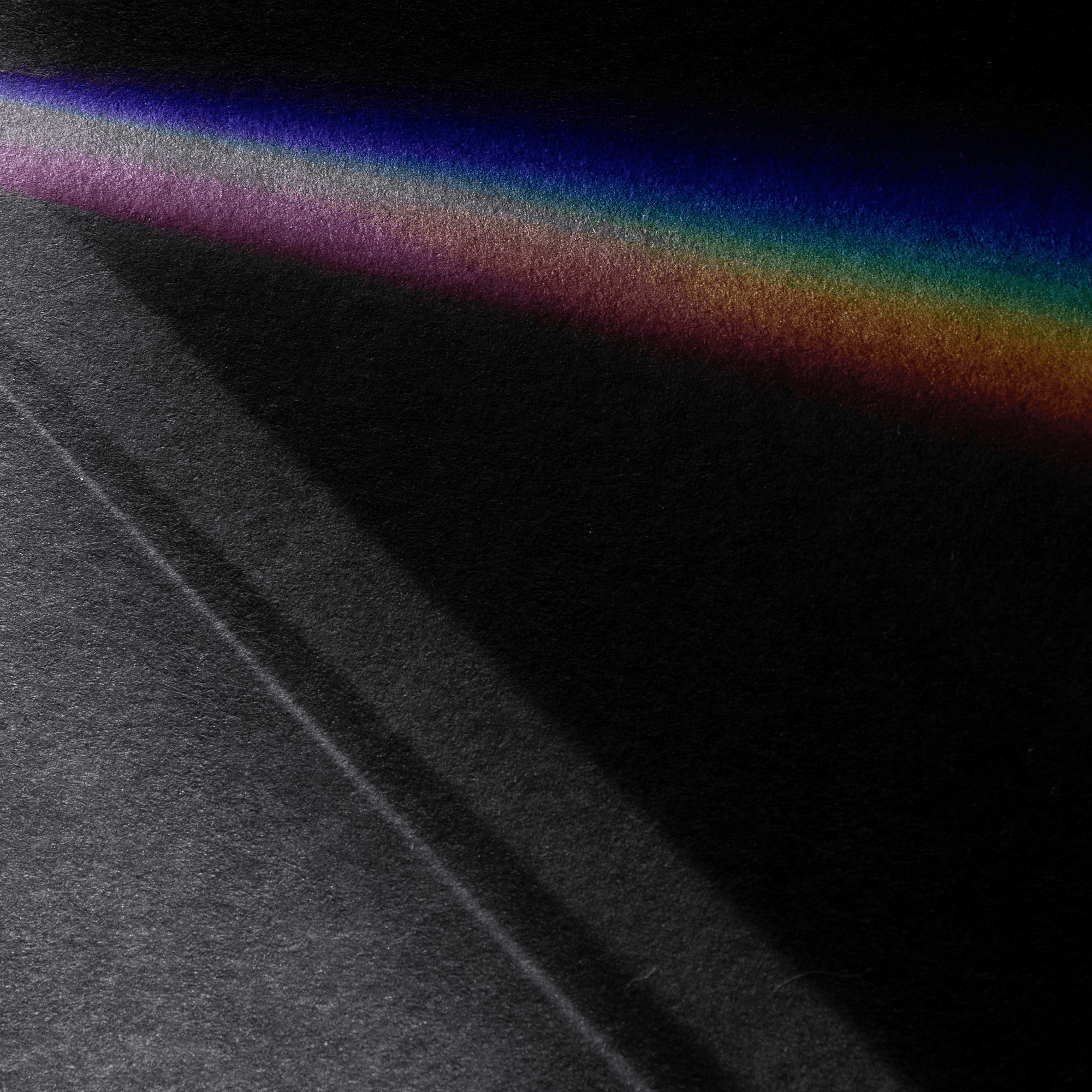 Abstract textured surface with prismatic light